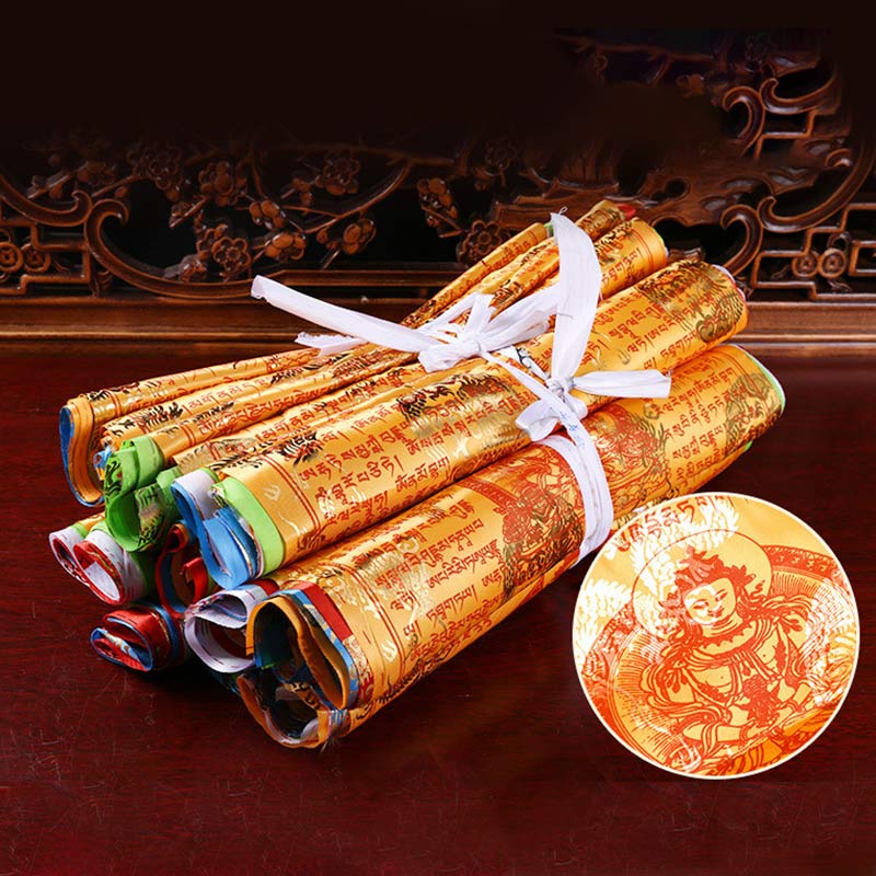 Tibetan prayer flags showing white air element color with black printed tibetan sutras and spiritual symbols on pure white fabric