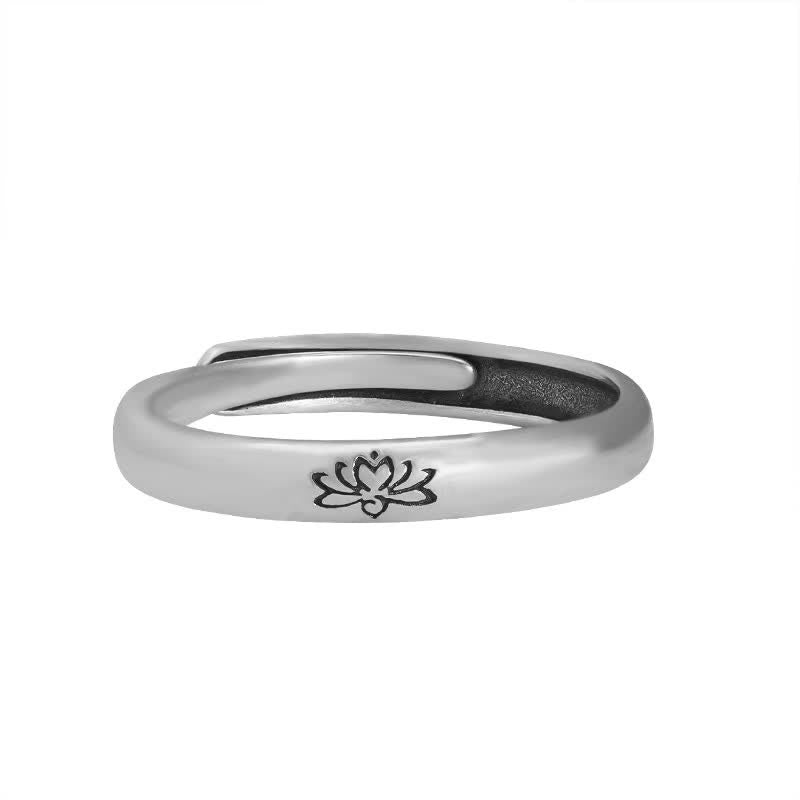 Adjustable lotus silver ring flat front view on white background with clear engraved lotus pattern