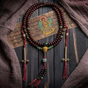 Complete circular 108 mala bead strand with purple bodhi seeds and green jade showing full prayer circle design