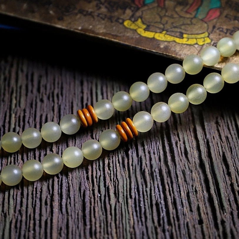 108 Tibetan mala beads bracelet with natural horn, amber, and onyx gemstone combination