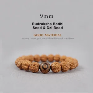 9mm Rudraksha Bodhi Seed bracelet with Dzi Bead centerpiece flat lay showing natural seed texture and brown eye-patterned bead