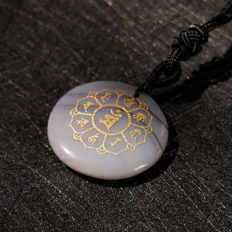 Agate crystal pendant with Om Mani Padme Hum mantra for emotional equilibrium and grounding