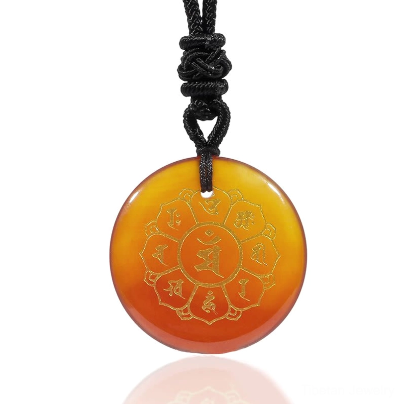 Agate Om Mani Padme Hum pendant with golden Sanskrit mantra for overall well-being