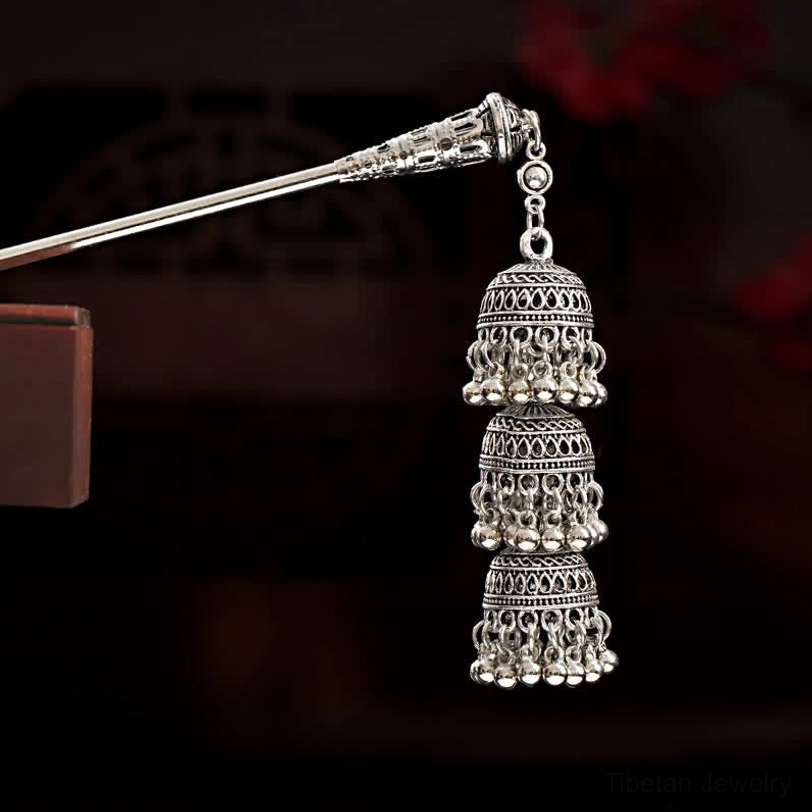 Artisan tassel hairpin featuring traditional Tibetan design with protective blessing symbolism