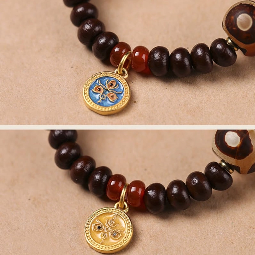 Authentic handmade Bodhi seed Dzi bead bracelet showing fine craftsmanship with natural materials, agate striping, and traditional tibetan design