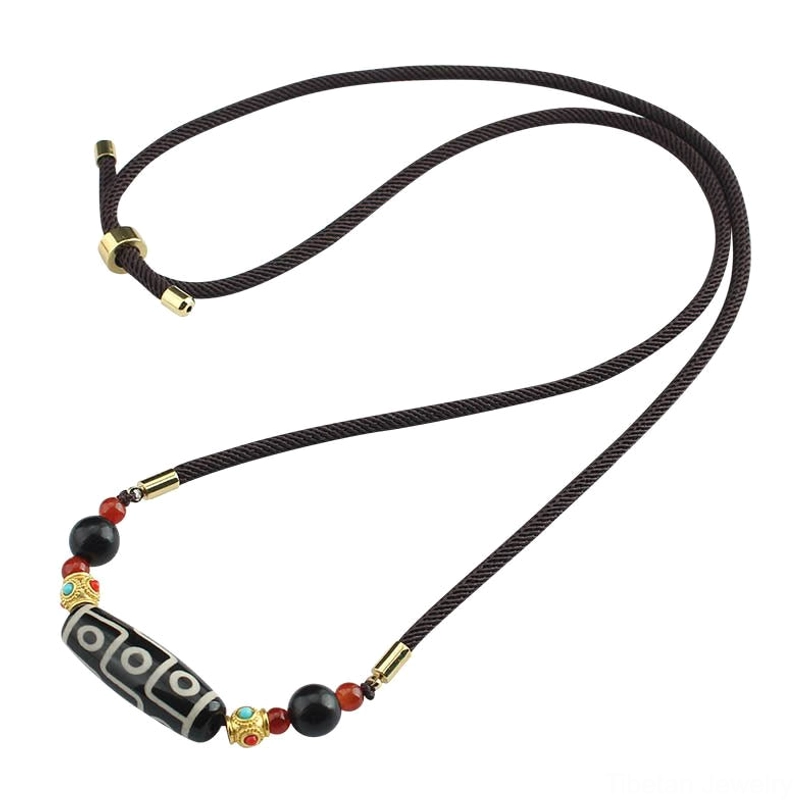 Authentic handmade Tibetan dzi bead necklace with natural stone and turquoise accents