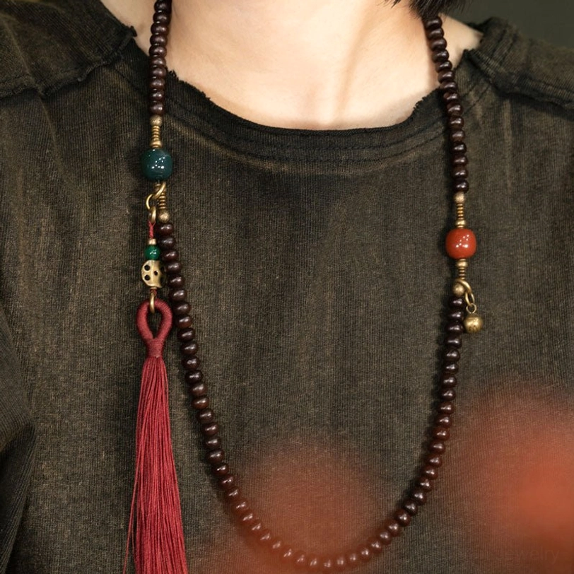 Authentic tibetan purple bodhi seed beads showing natural purple hue and texture