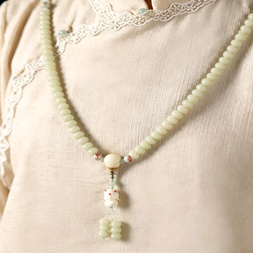 Authentic Tibetan white bodhi seed 108 bead mala with natural color variation and spiritual significance