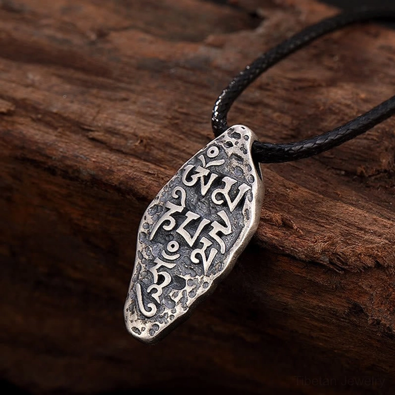 Handcrafted Tibetan silver pendant with Om Mani Padme Hum mantra, authentic Buddhist spiritual jewelry