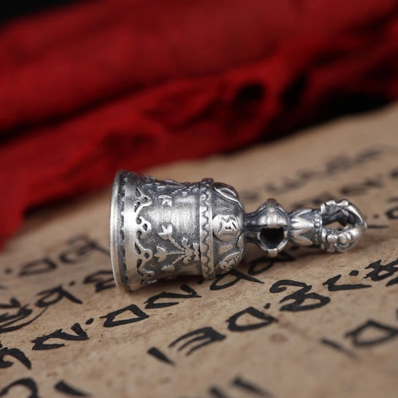 Authentic Tibetan dorje bell in 925 sterling silver with traditional brass clapper and spiritual protection symbols