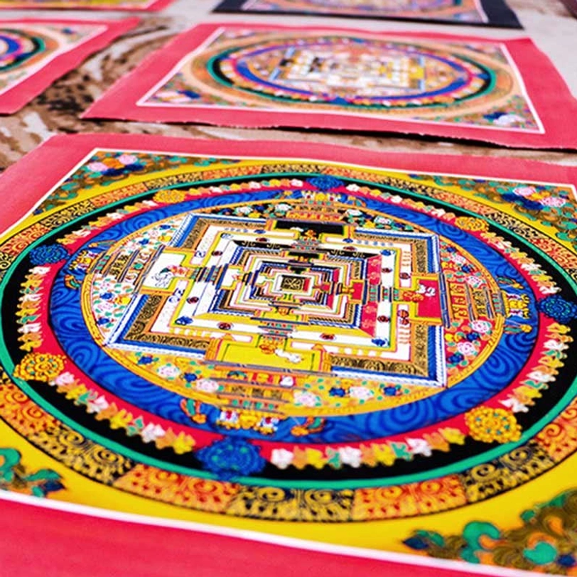 Authentic Tibetan mandala thangka with natural mineral pigments and traditional artisan craftsmanship