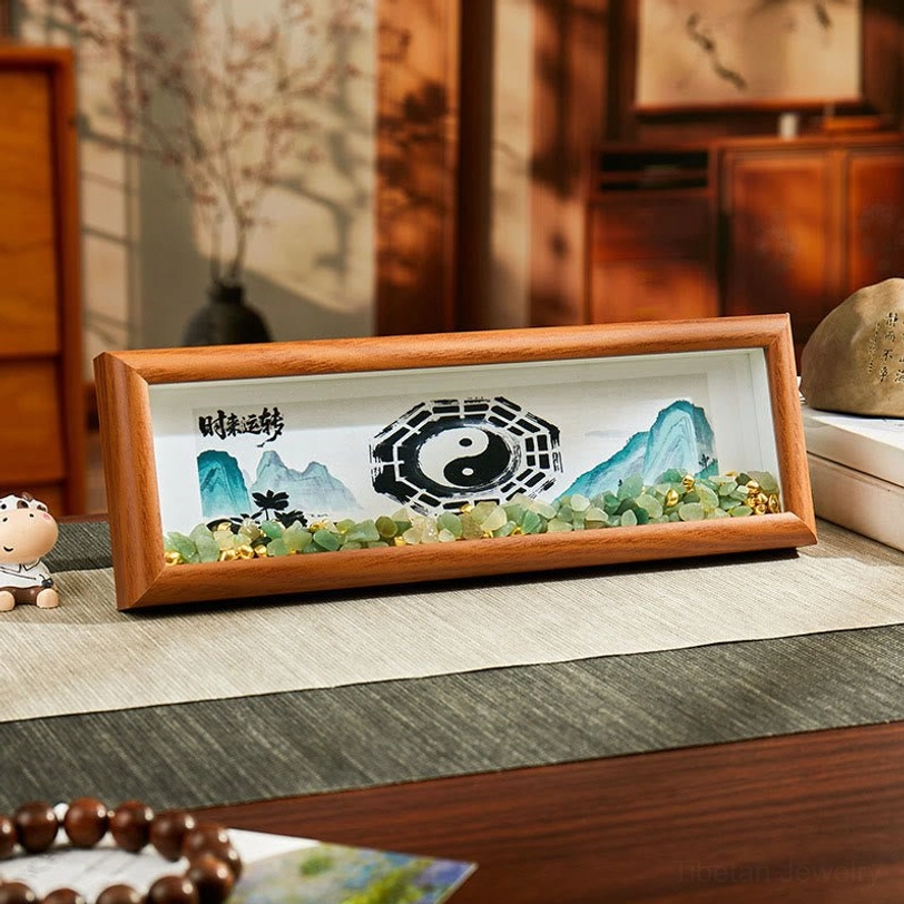 Handmade feng shui decorative photo frame with Bagua, Yin Yang center, green crystal gravel on Chinese home desk