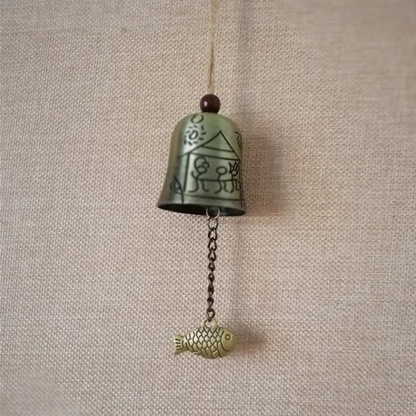 Family blessing Tibetan feng shui wind chime with complex embossed patterns representing household harmony