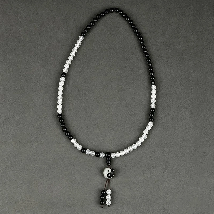 Black Obsidian Bagua bracelet showcasing yin-yang centered trigram pendant design