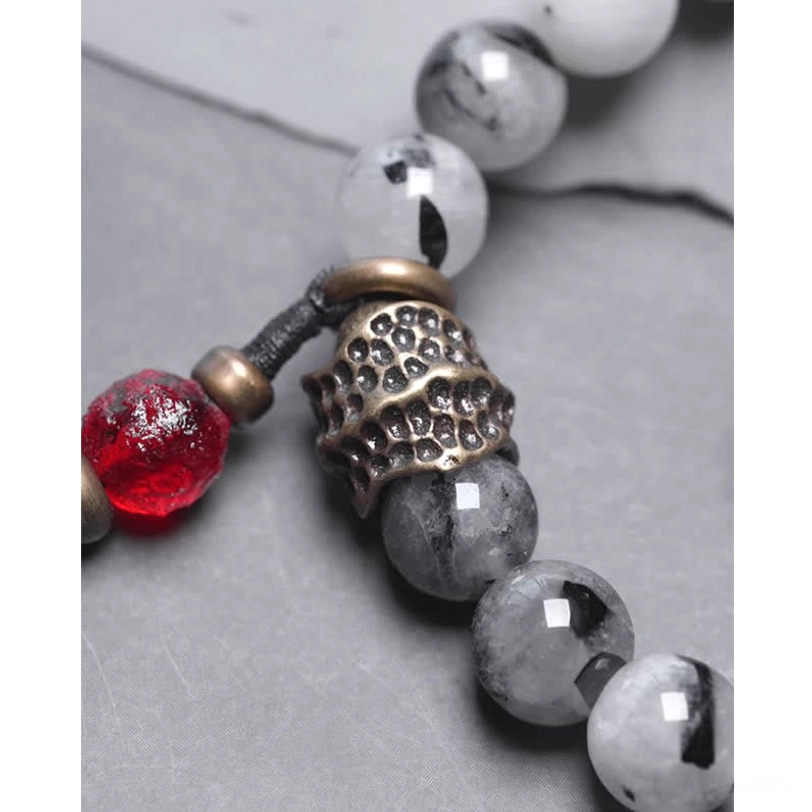 Black obsidian beads complementing black rutilated quartz couple bracelet
