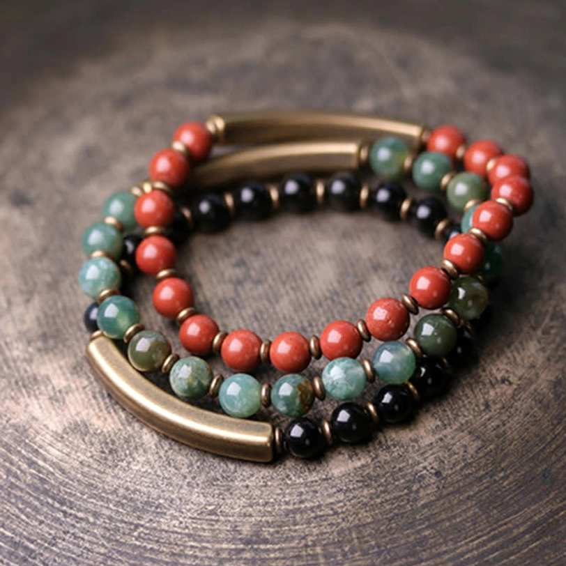 Black Obsidian protective healing bracelet worn on wrist - natural stone close-up
