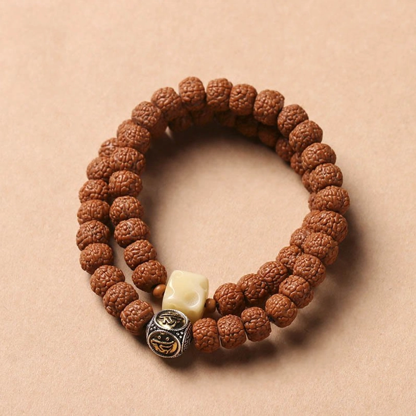 Bodhi seed Dzi bead bracelet with dragon scale pattern design and protective spiritual significance