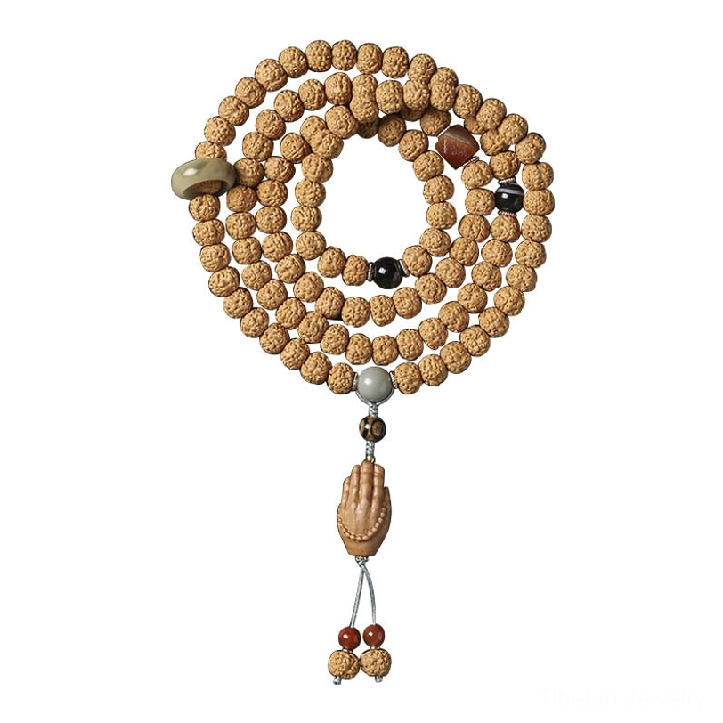 Bodhi seed and three-eye Dzi bead bracelet collection display with multiple spiritual charm options