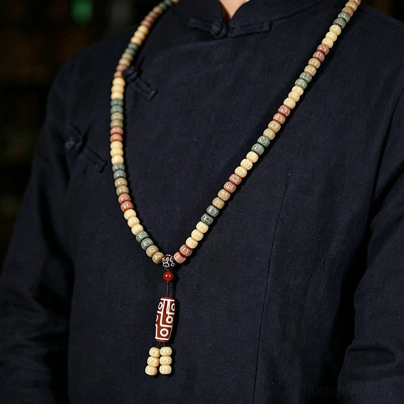 Bodhi seed prayer beads mala 108 beads with hand-painted dzi bead pendant displaying warm earth tones