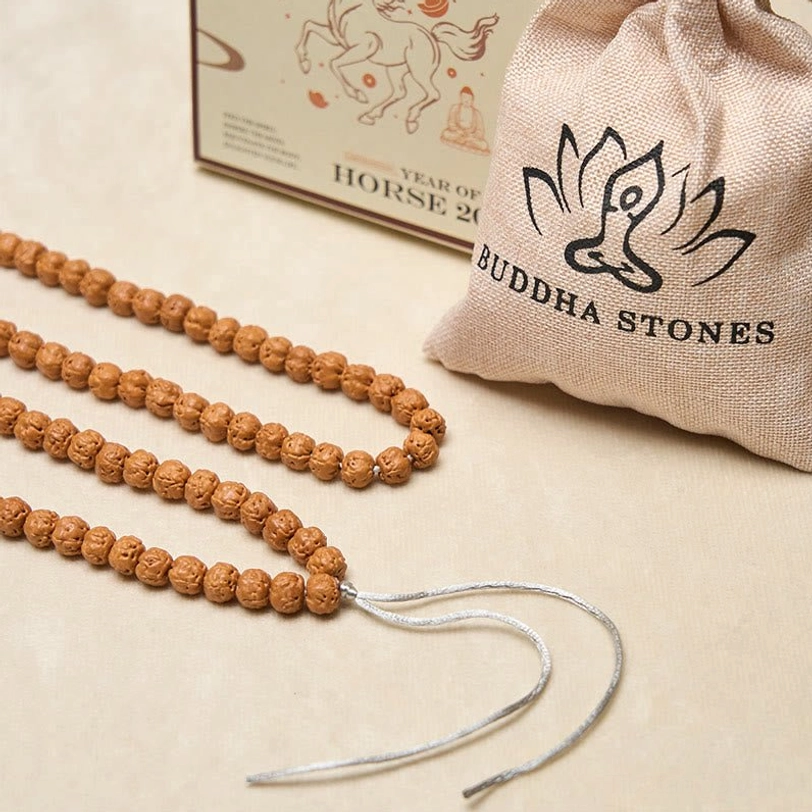 Tibetan bodhi seed mala with authentic packaging including branded drawstring pouch and product box retail