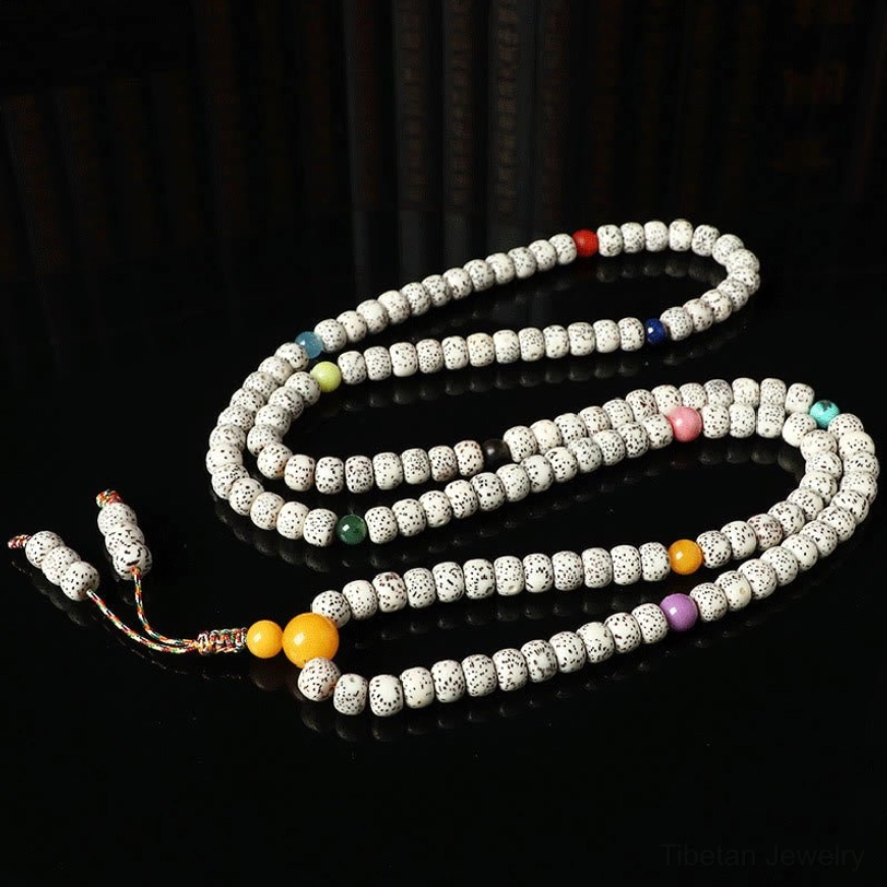 Bodhi seed mala set with amber beads and woven tassel showing multiple loop arrangement