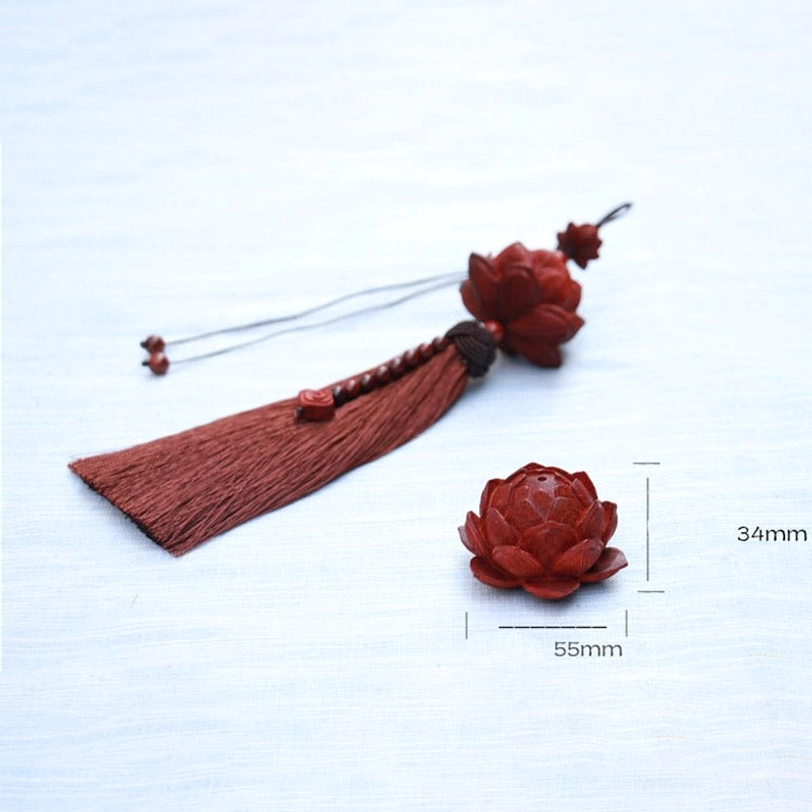 Brown Tibetan red sandalwood lotus tassel bracelet and car decoration showing warm earth tone finish and quality craftsmanship