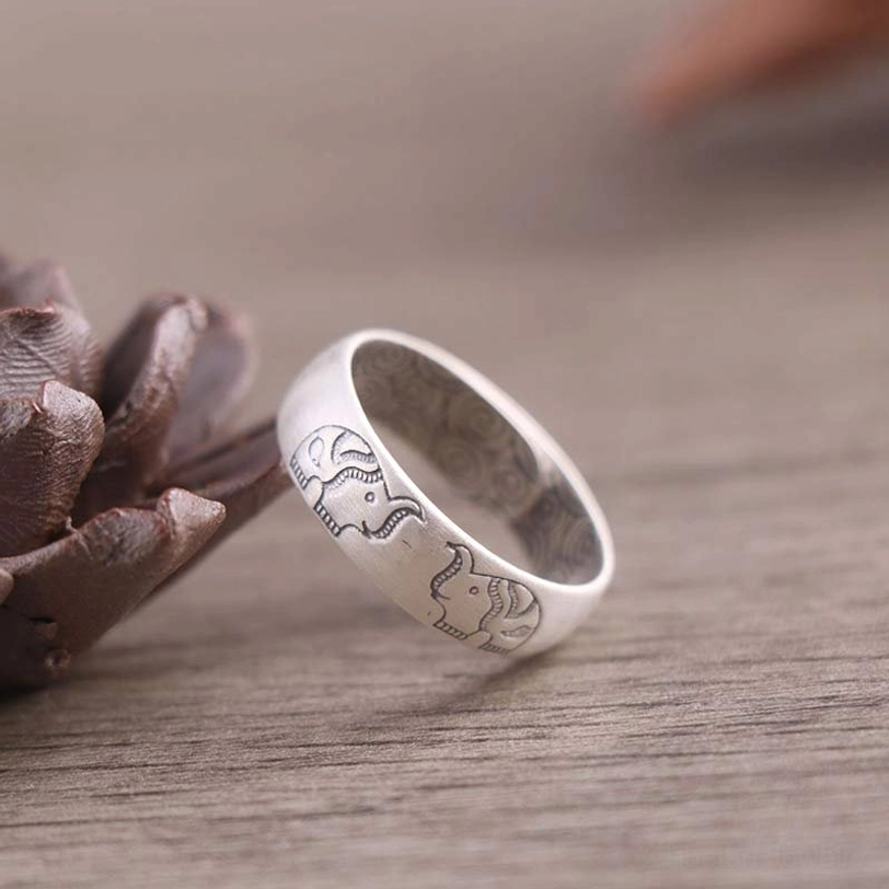 brushed sterling silver elephant ring with tibetan motif - open adjustable band good fortune symbol