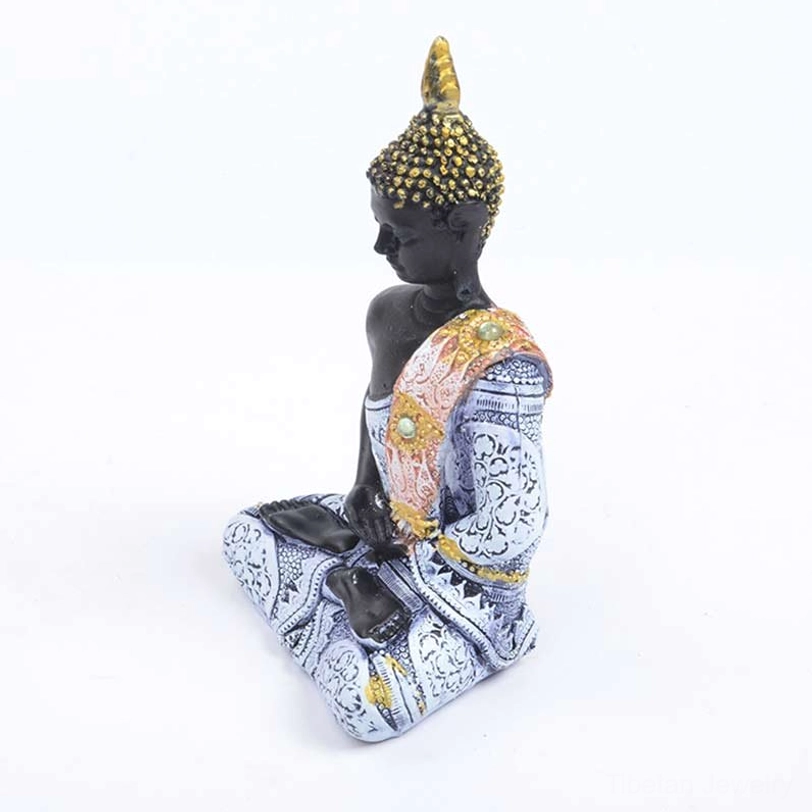 Side profile view of Tibetan Buddha resin statue, blue-gray robe with gold trims and floral patterns, meditation mudra hands, sacred home altar decoration
