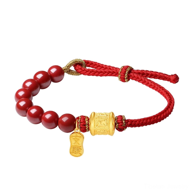 Natural cinnabar beads and 999 sterling silver om mani padme hum blessing bracelet close-up detail