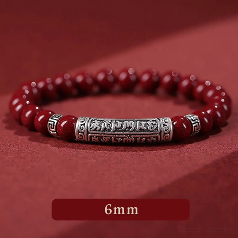 6mm cinnabar Six True Words bracelet side view with size label showing polished red beads and ornate engraved silver accent