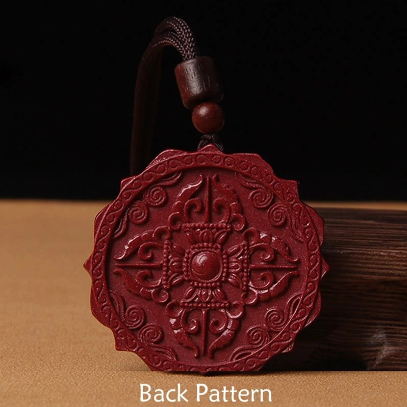 Back pattern of Tibetan cinnabar pendant showing carved Vajra cross protection symbol on Om Mani Padme Hum necklace