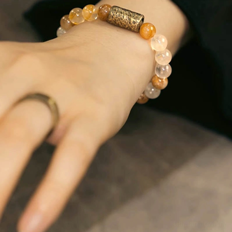 Clear quartz and purple phantom crystal combination bracelet showing complementary stone energy pairing