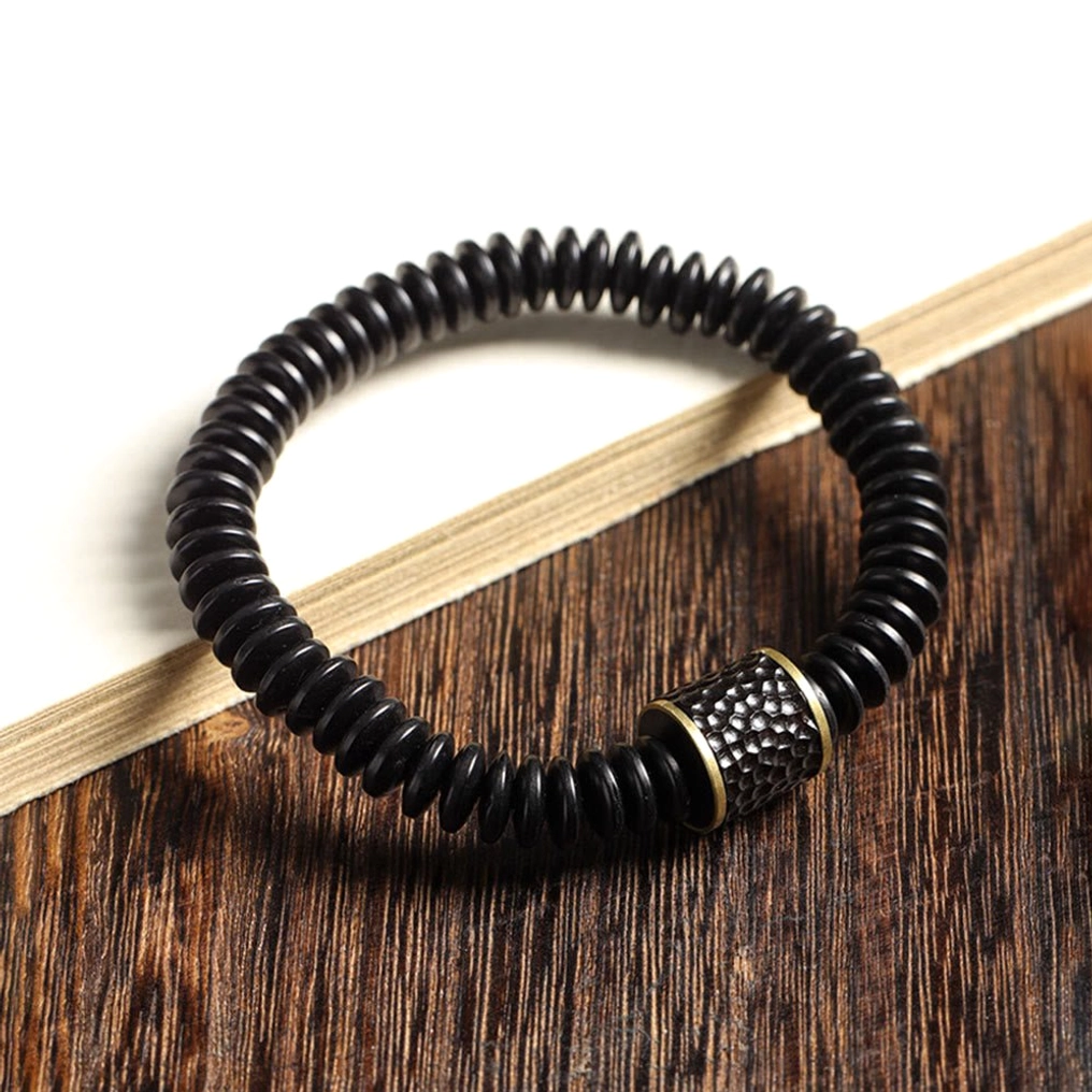 Coconut shell bracelet regular style 14-16cm wrist circumference showing beaded pattern