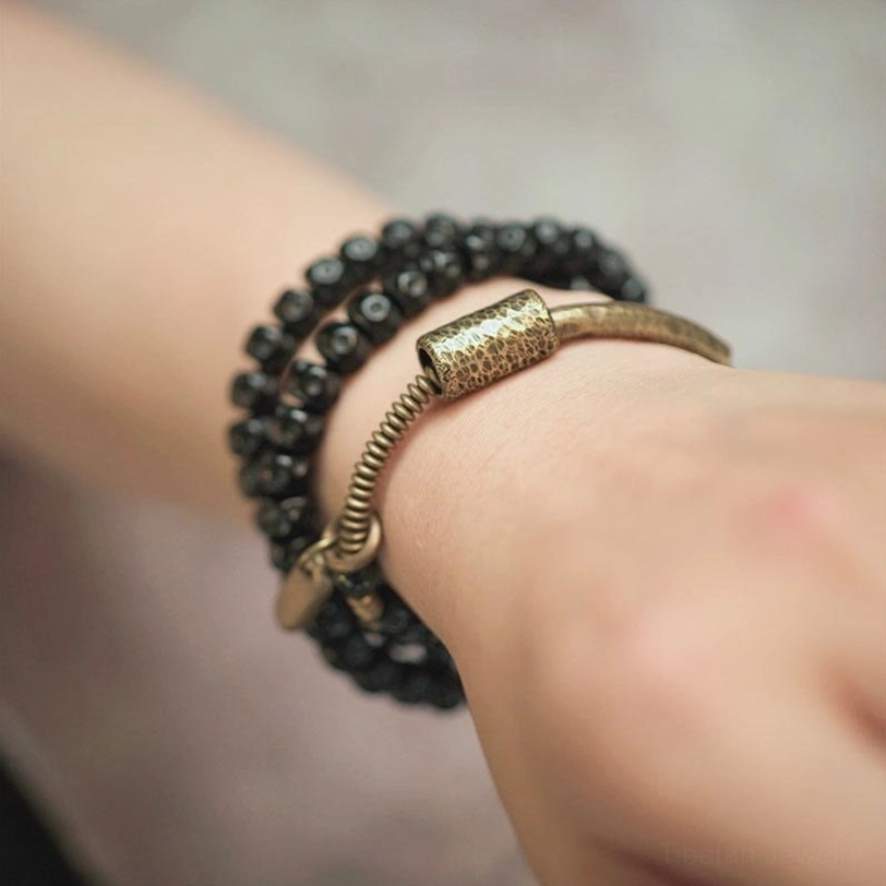 Coconut shell brass triple wrap bracelet - spiritual healing jewelry with natural materials and vintage aesthetic