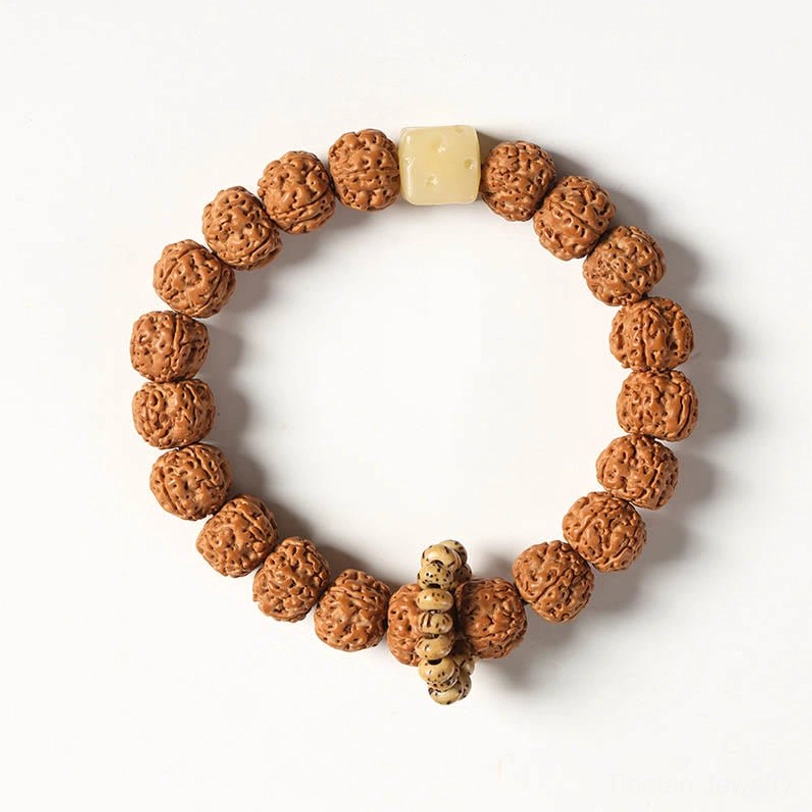 Coiled Bodhi seed prayer mala with three-eye Dzi bead and decorative tassel pendant