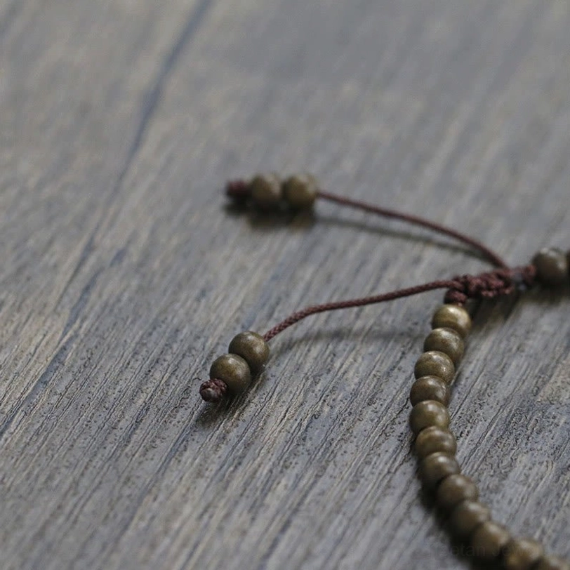 Full product shot of handmade copper beads bracelet displaying bead uniformity and artisan craftsmanship quality