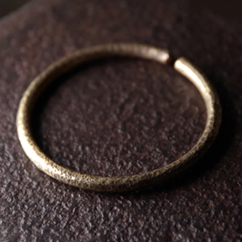 Single smooth hammered copper cuff bracelet, open circular design in muted gold tone