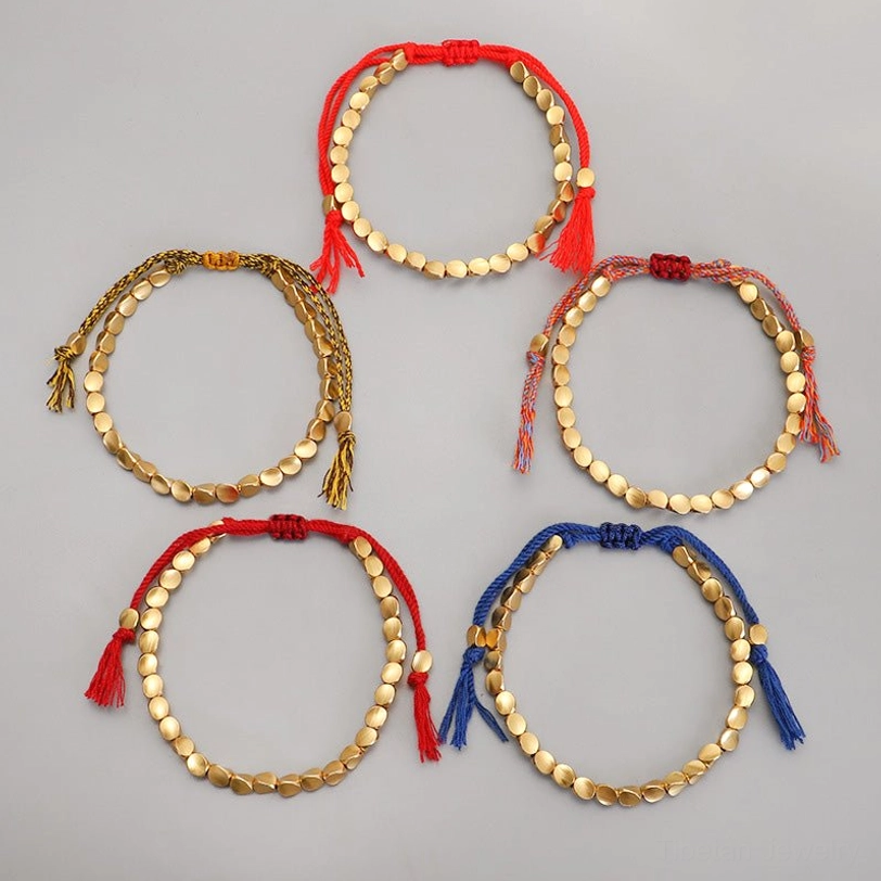 Tibetan copper bracelet styling suggestion on wrist demonstrating adjustable fit and spiritual energy aesthetic