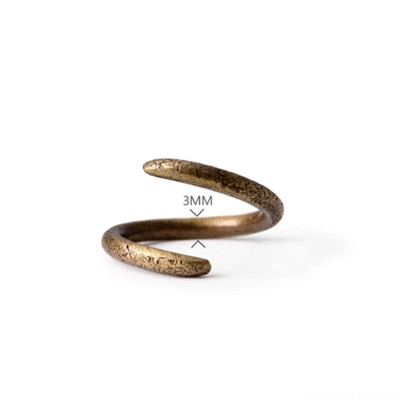 Copper spiral adjustable ring lifestyle photography showing spiritual meditation jewelry practice