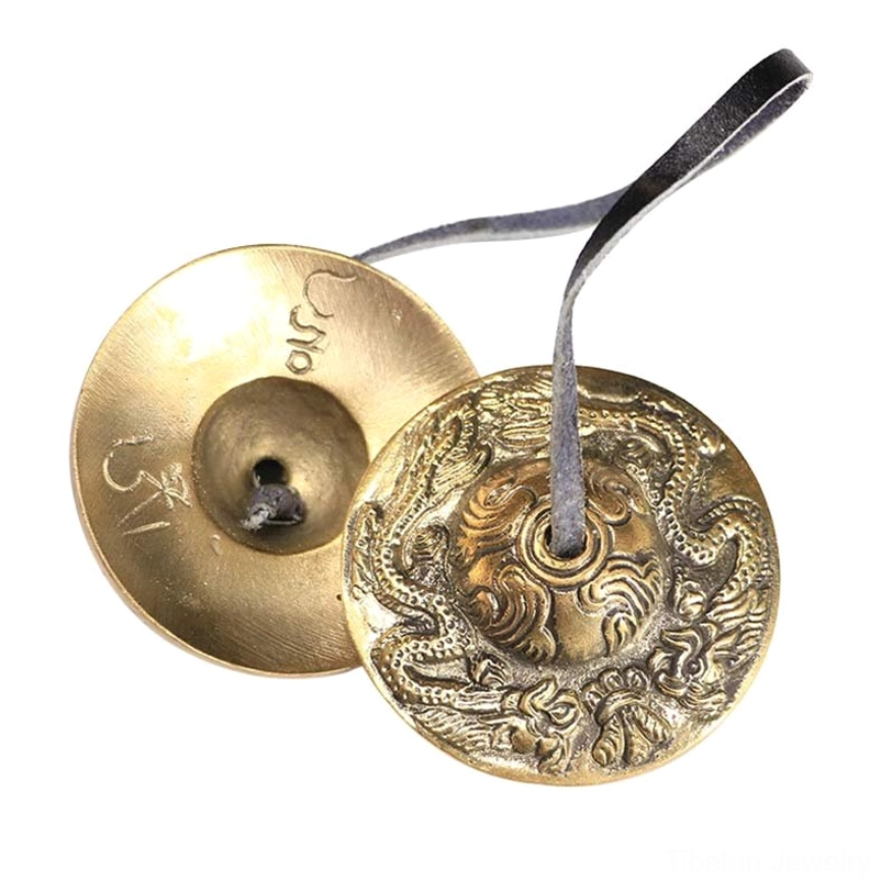 Copper tingsha cymbals for chakra balancing and space clearing spiritual practice