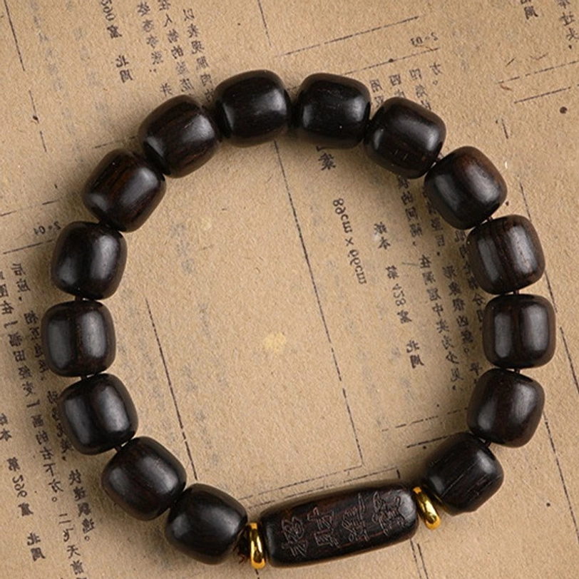 Dark wood barrel bead bracelet with gold brass spacers authentic Tibetan design