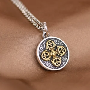 Double dorje vajra necklace side angle showing 3D depth and thickness of handcrafted silver pendant