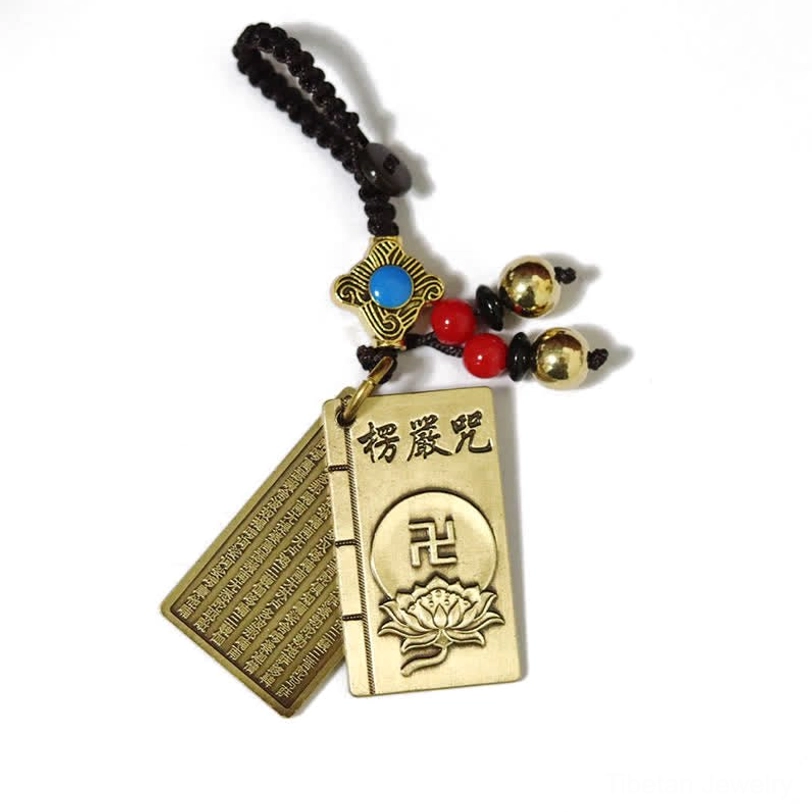 Double-page Shurangama Mantra brass keychain with dual-sided engraved Buddhist mantras and bead tassels