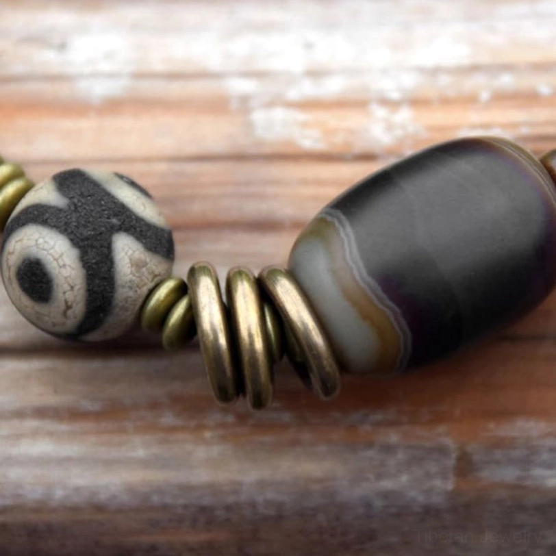 Double wrap Tibetan sacred Dzi bead bracelet with ebony and sandalwood natural materials