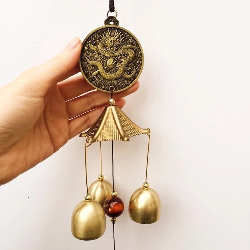 Dragon carved bronze wind chime with amber beads and brass bells Tibetan style