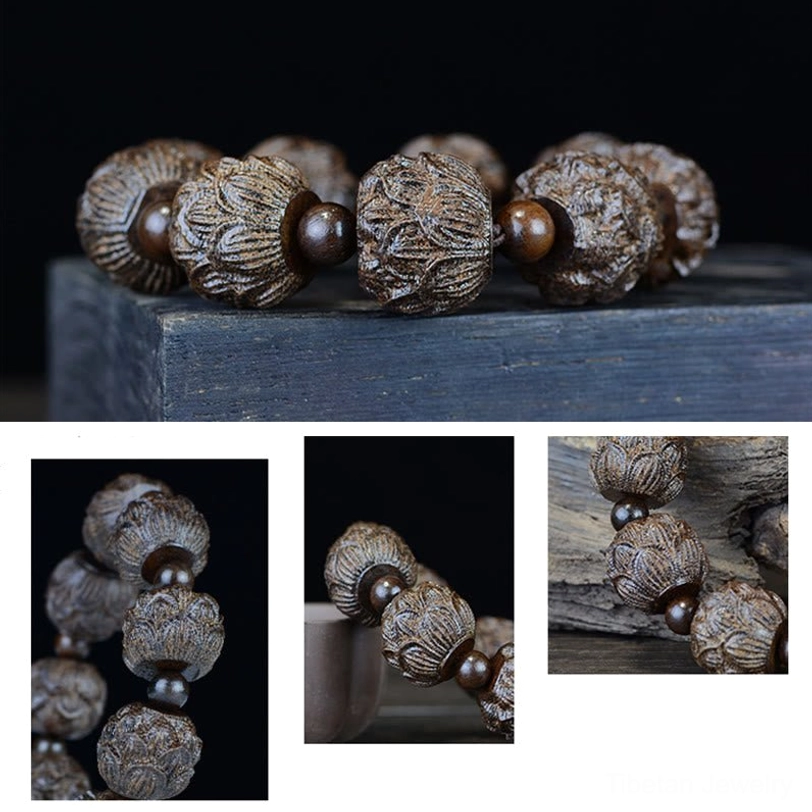 Close-up detail of hand-carved dragon bead on ebony wood bracelet showing intricate dragon mythology carving