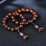 Dragon Vein Agate healing bracelet with glossy beads in multiple colors - blue, white, brown, dark red, and green options