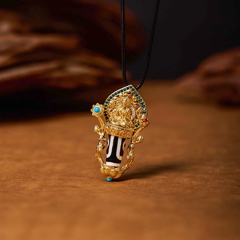 Striped Dzi bead gold cage pendant necklace with blue and red gemstone inlays, front three-quarter view