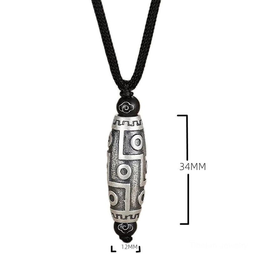 Nine-eye dzi bead necklace pendant with size measurements labeled 34mm length by 12mm width for reference