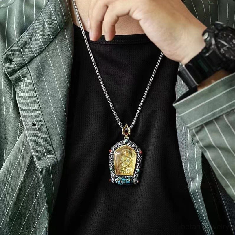 Dzi bead rotating mechanism detail Tibetan protection amulet close-up
